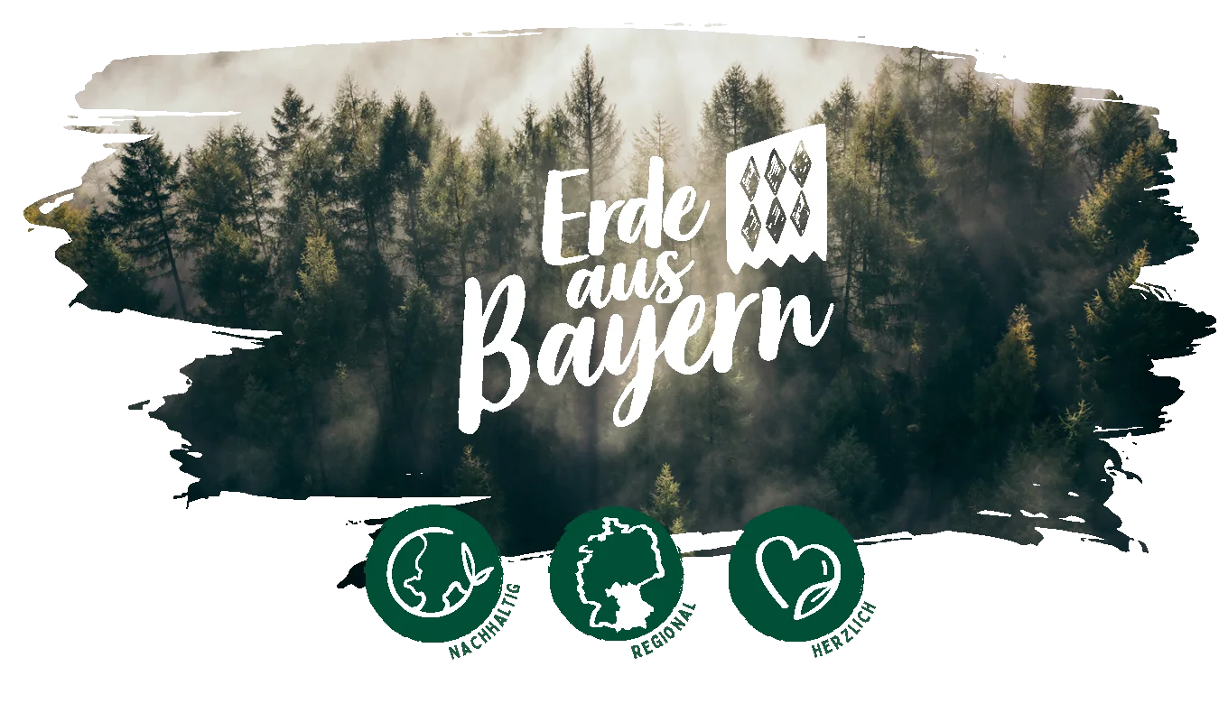Schriftzug Erde aus Bayern vor Wald